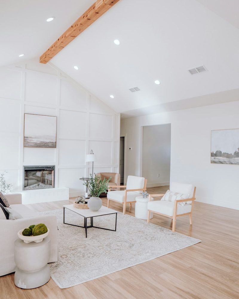 Light-toned LVT plank flooring in a bright open-plan living room